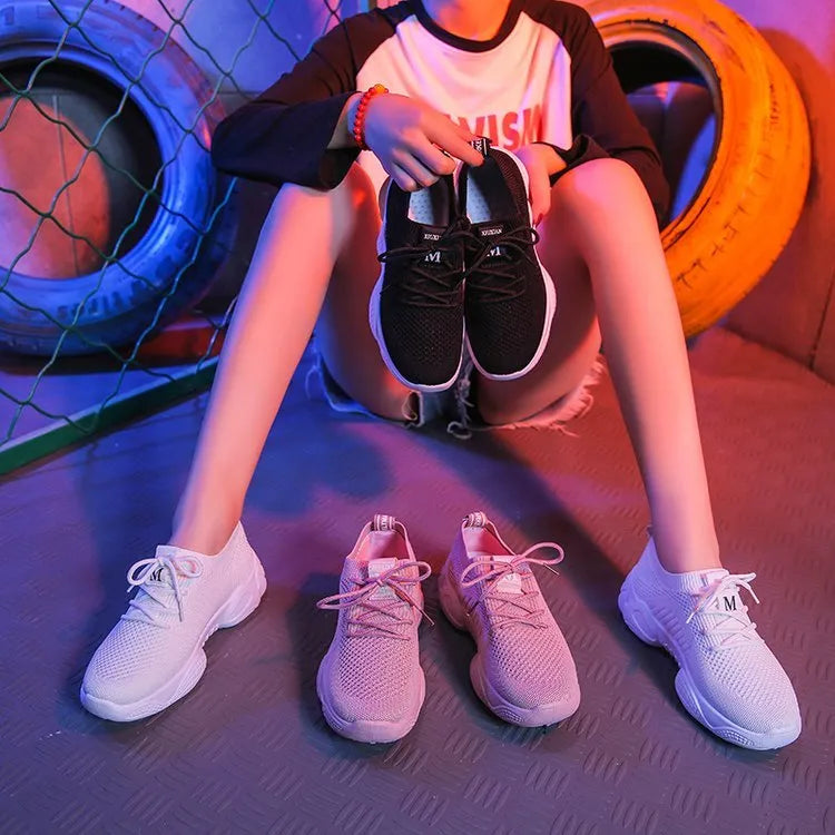Women's white woven sports shoes with thick rubber soles and front strap design