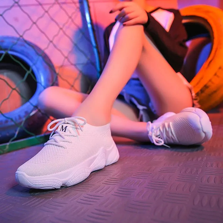 Women's white woven sports shoes with thick rubber soles and front strap design