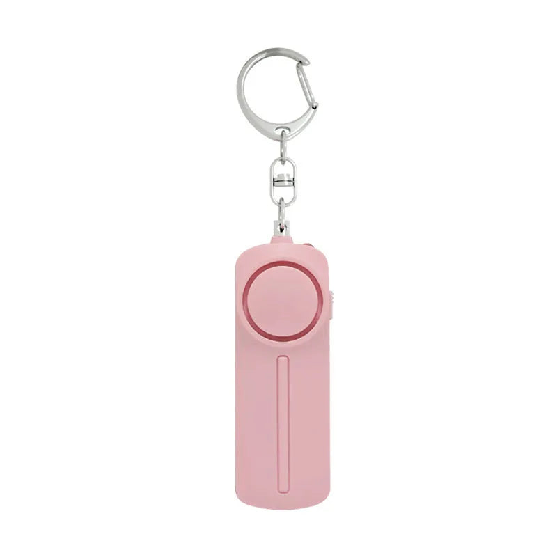 Compact pink personal safety alarm with keychain attachment showing dimensions 86x30x20mm