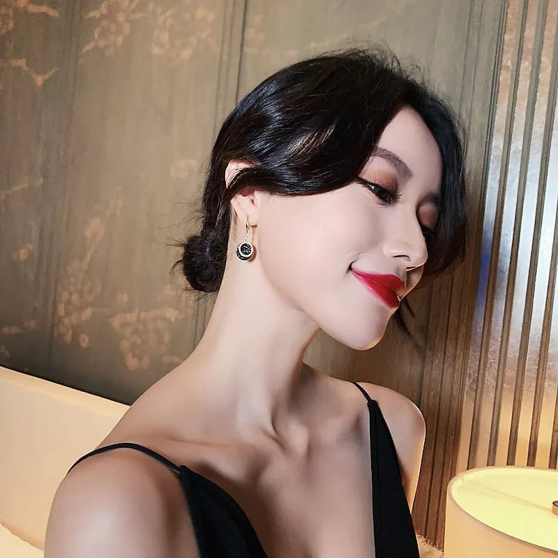 Black geometric drop earrings with round piece design, 3.6cm length, retro Hong Kong style