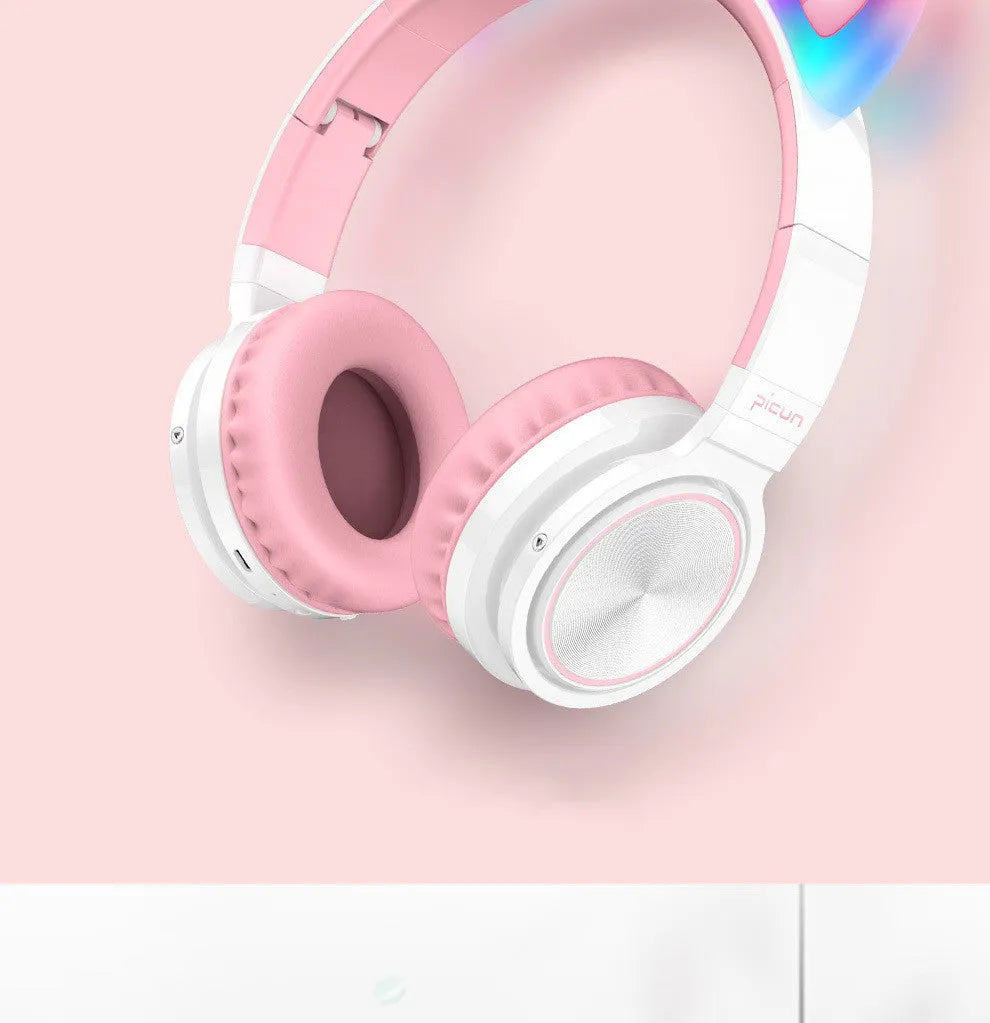 Pink and white wireless Bluetooth headset with over-ear design and 40mm speakers