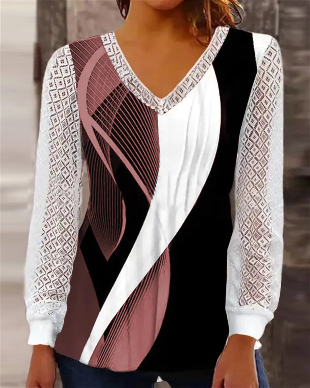 Purple loose V-neck women's top with hollow-out lace pattern and long sleeves.