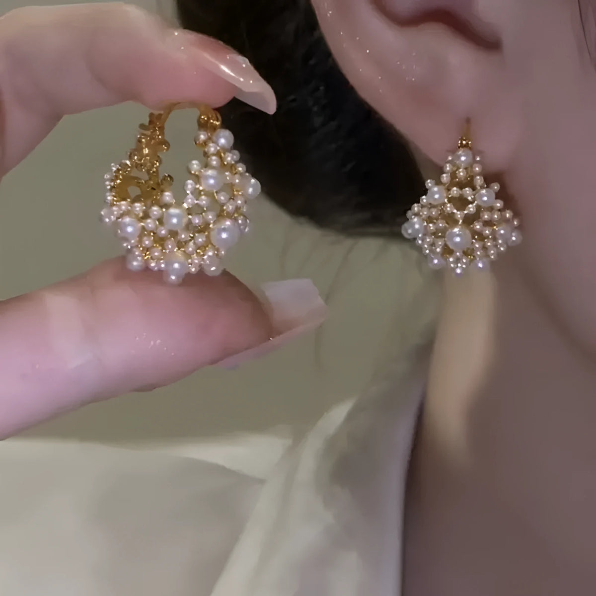 Gold copper flower basket earrings with small rice-shaped beads and pearl inlay detail