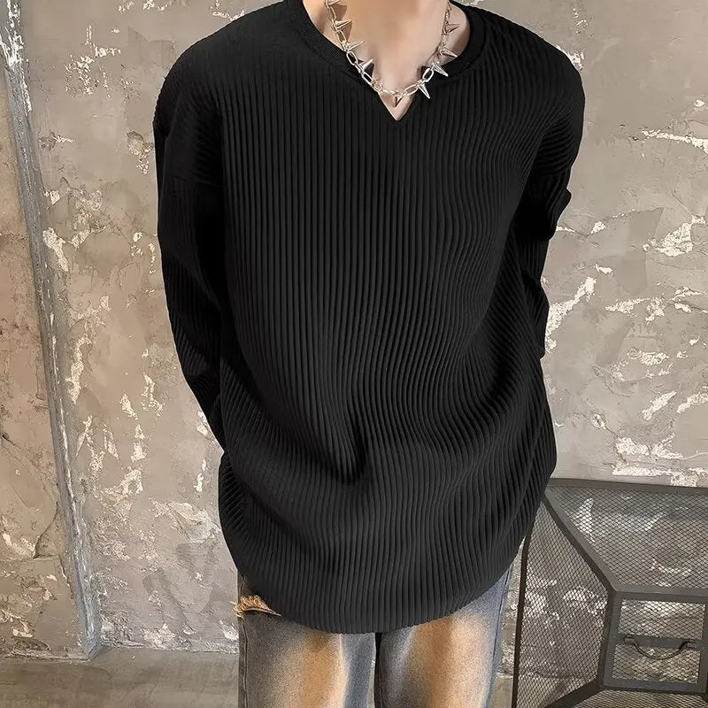 Plus size loose pullover top with striped texture and long sleeves in black colour