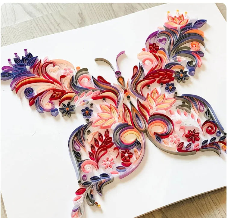 20 inch blue and pink butterfly quilling papercraft illustration pack with glue, scissors, awl, and tweezers