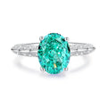 S925 silver geometric ring with oval emerald-inspired stone and high carbon diamond details on finger