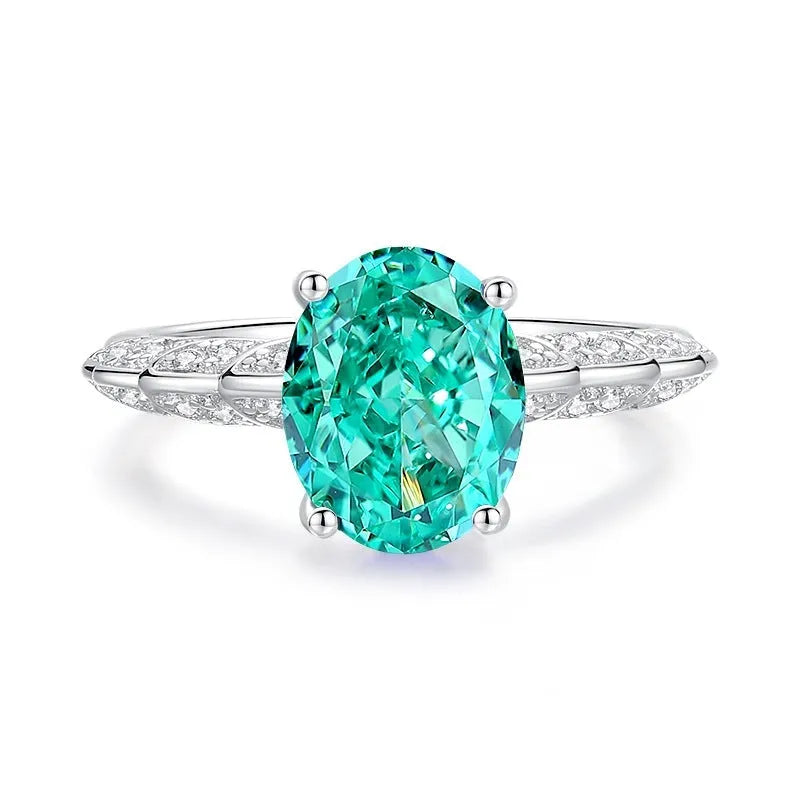 S925 silver geometric ring with oval emerald-inspired stone and high carbon diamond details on finger