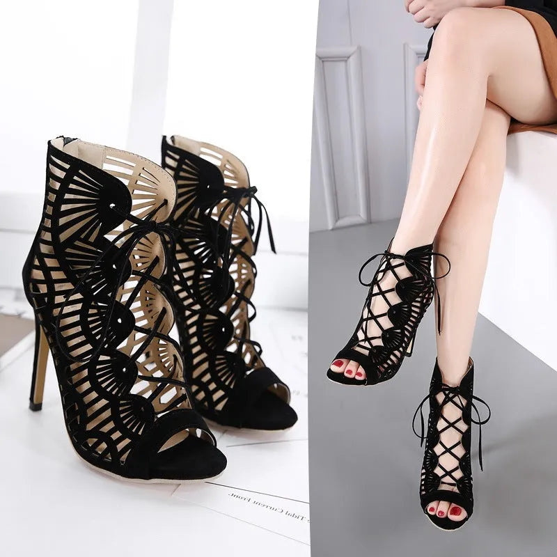 Black suede lace high heels with fish mouth toe, stiletto heel above 8 cm, and hollow detail.