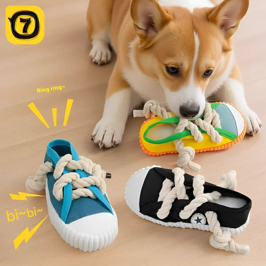 Slipper-shaped plastic dog chew toy with squeaker in three colour options