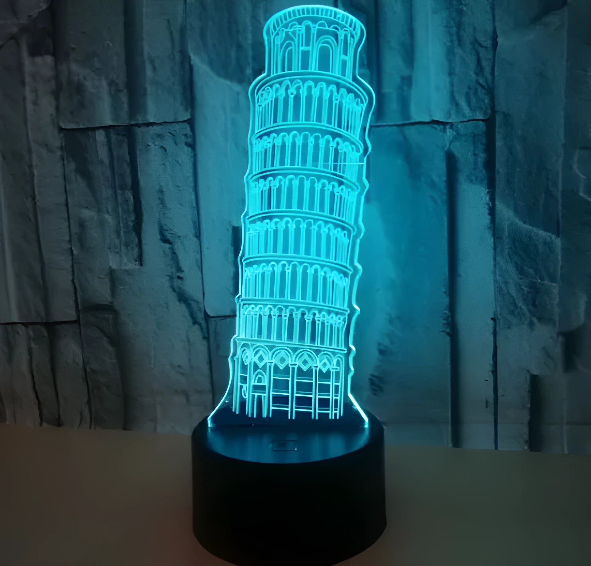3D Leaning Tower of Pisa acrylic nightlight on black base with multi-colour LED illumination.