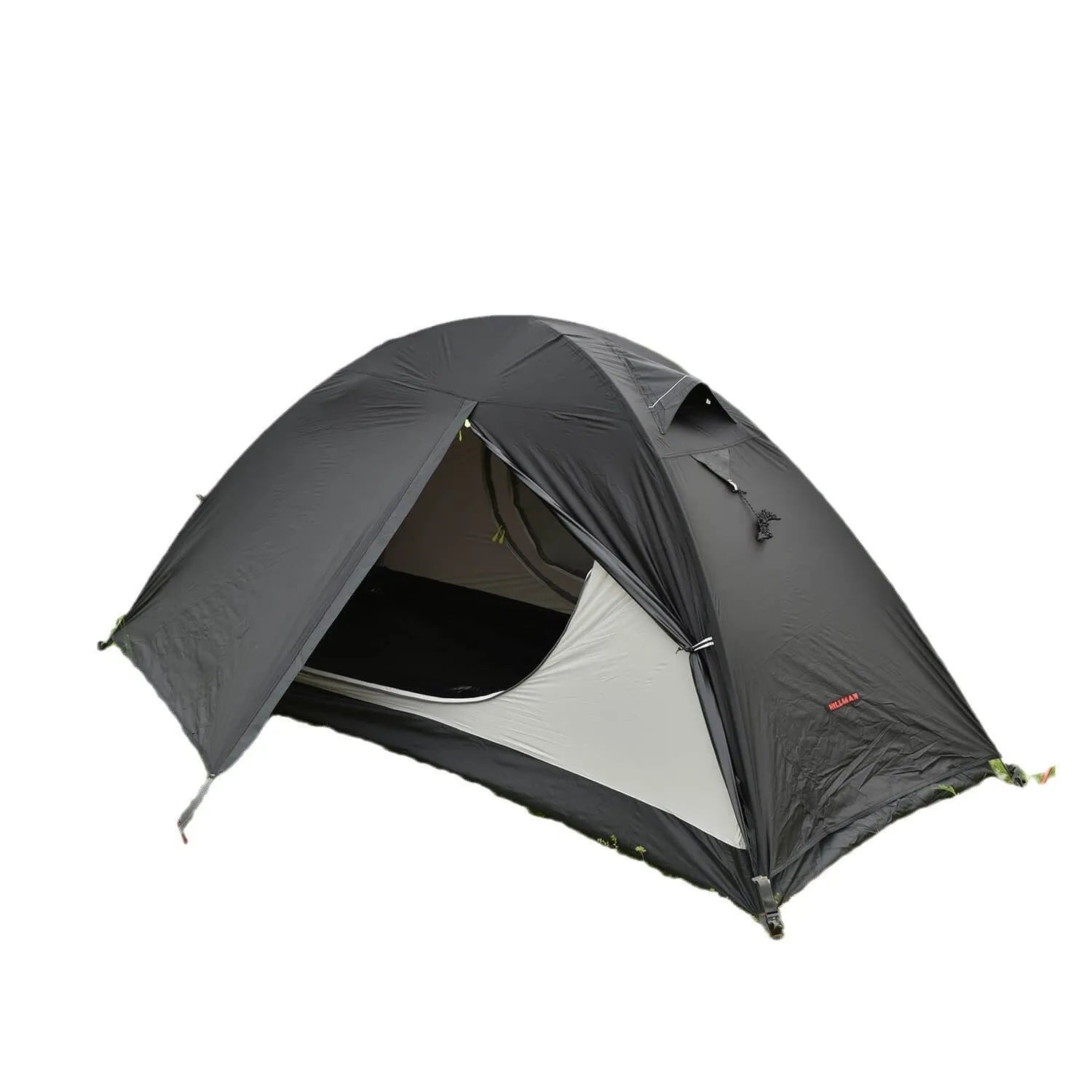 Single person orange hiking tent with aluminium poles pitched in outdoor setting