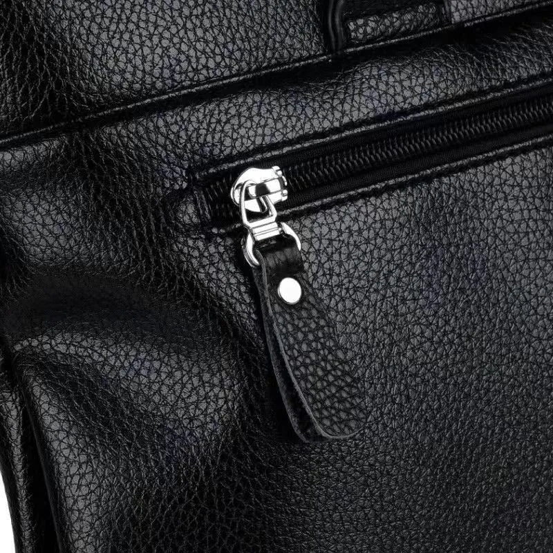 Black and brown PU leather men's messenger bag with shoulder strap showing splicing detail