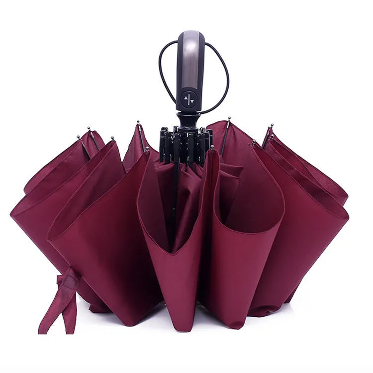 Triple folding automatic business umbrella in black with steel frame and rubber handle