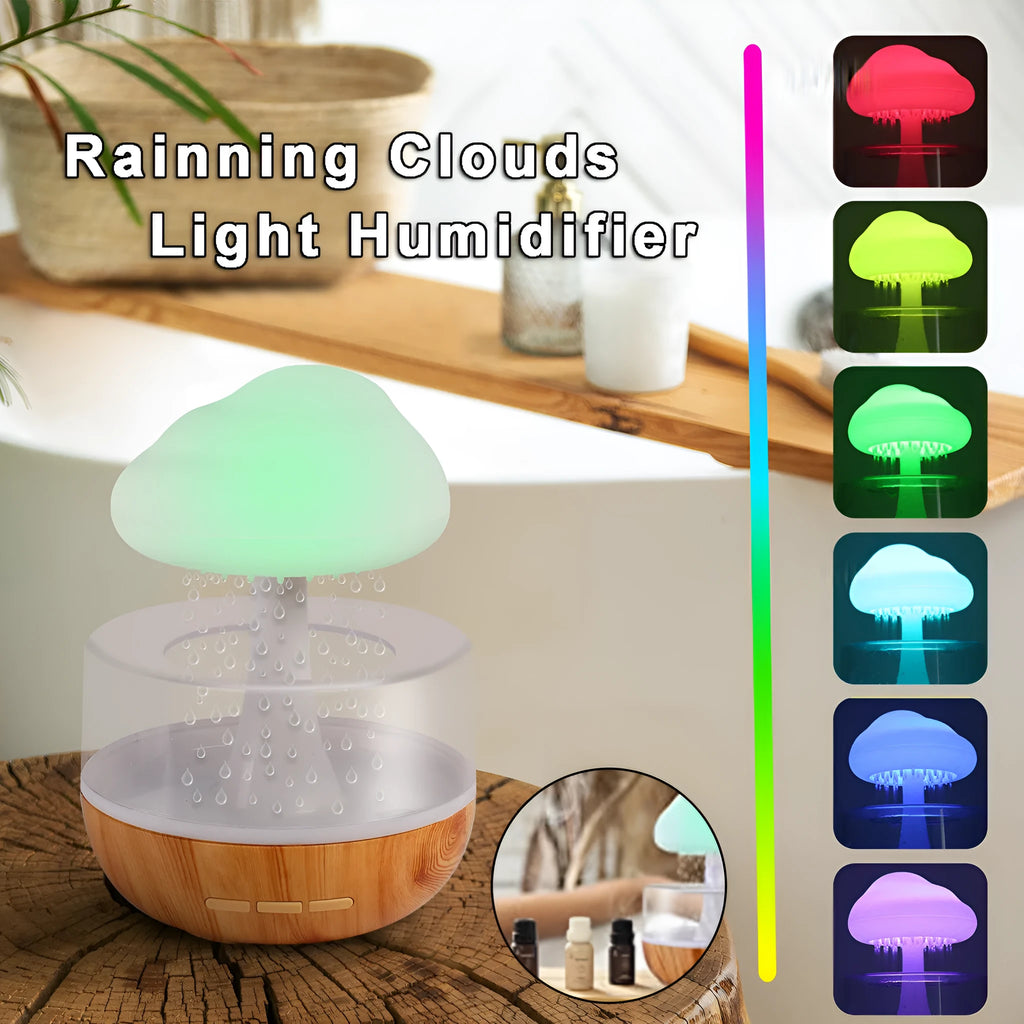 White cloud-shaped humidifier with changing colour lights and water drop display for essential oil diffusion