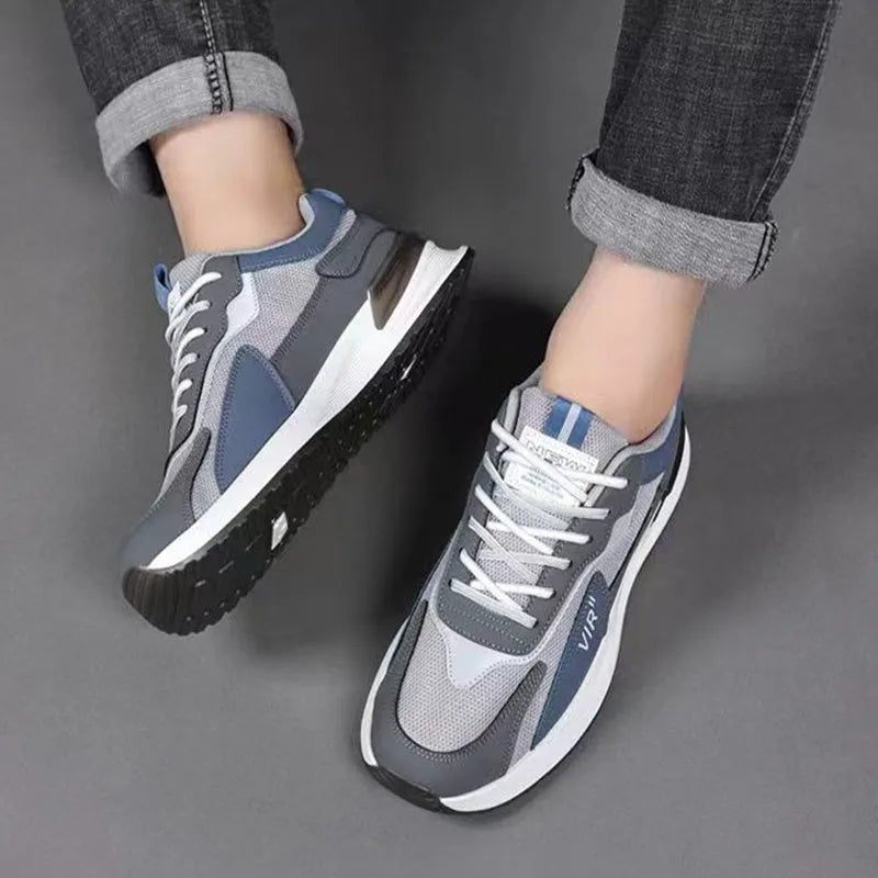 Men's colour block mesh sneakers in grey with lace-up closure and low-top design.