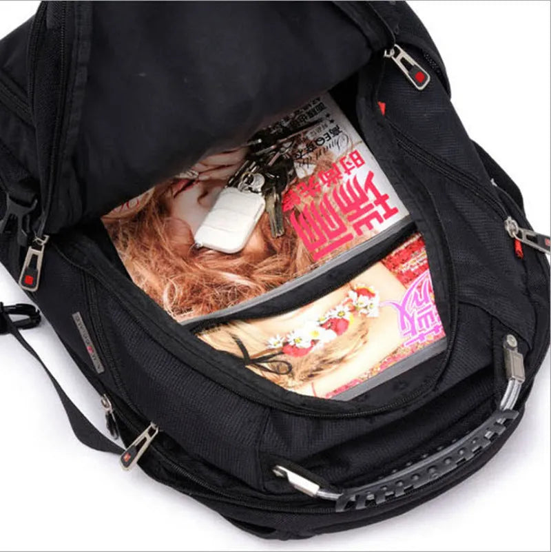 Black business computer backpack open to show three compartments and laptop sleeve