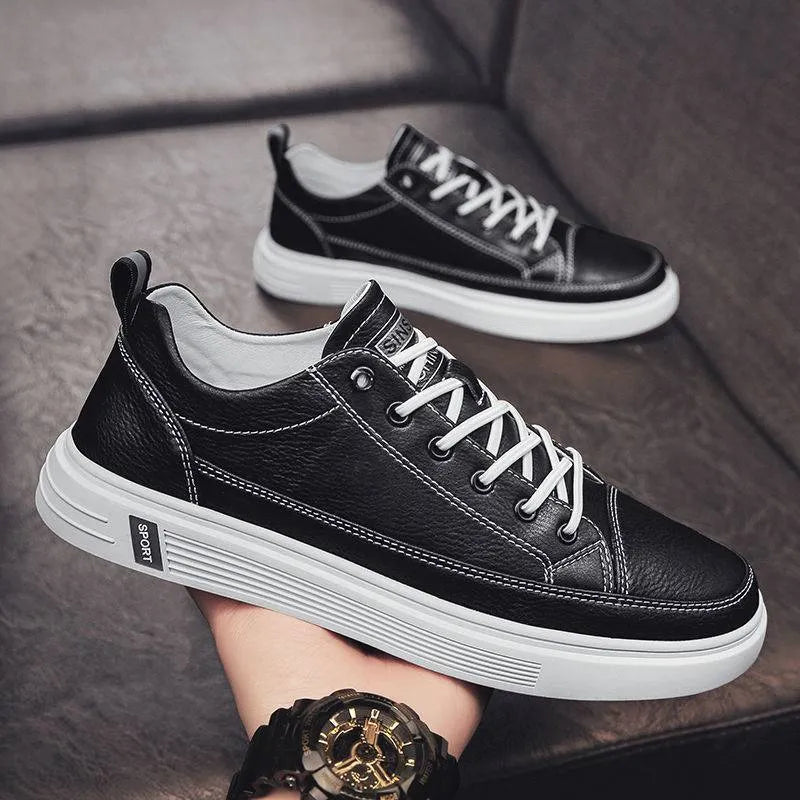Men's white casual shoes with round toe and low heel on a flat breathable sole