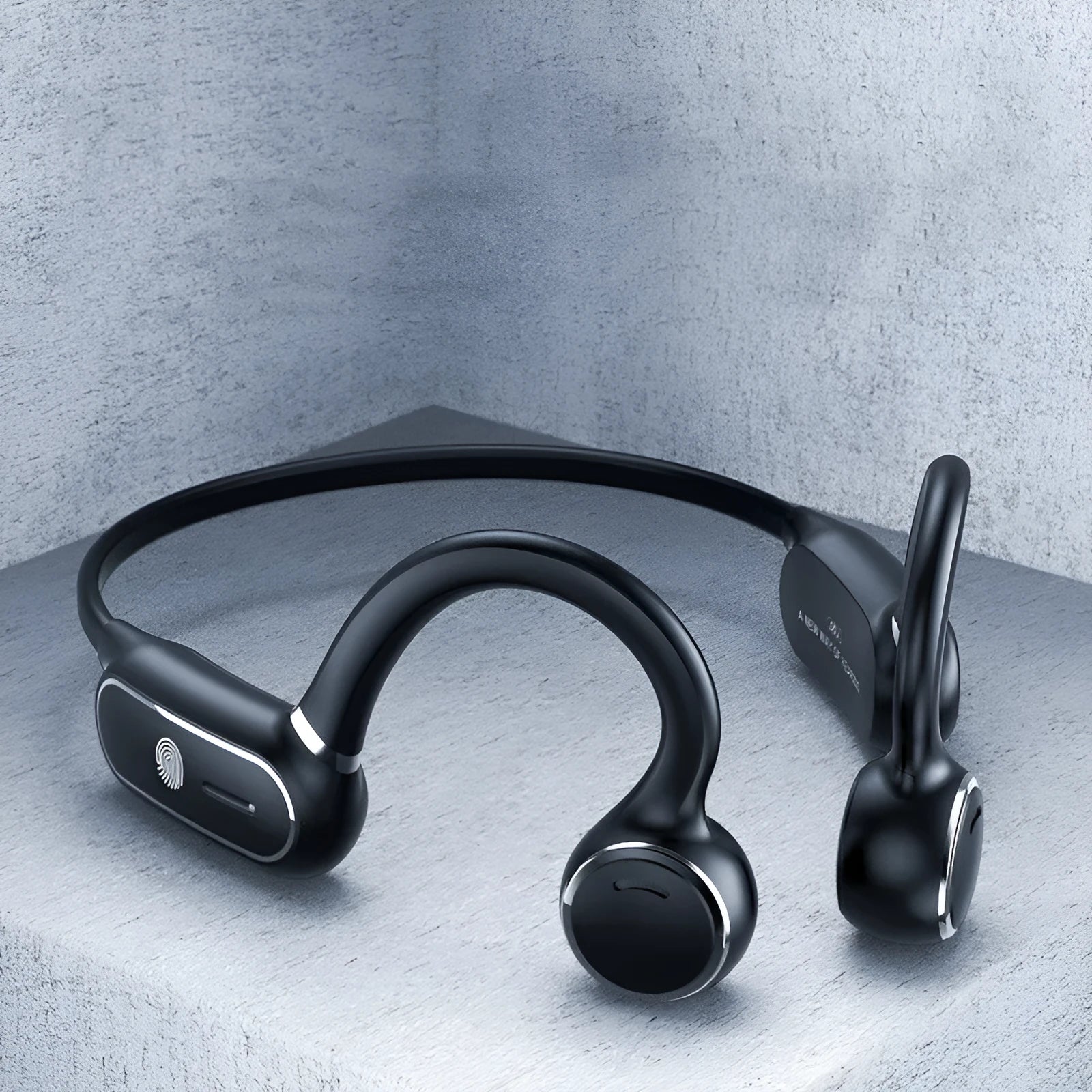 Black air conduction Bluetooth earphone with titanium frame showing open-ear design
