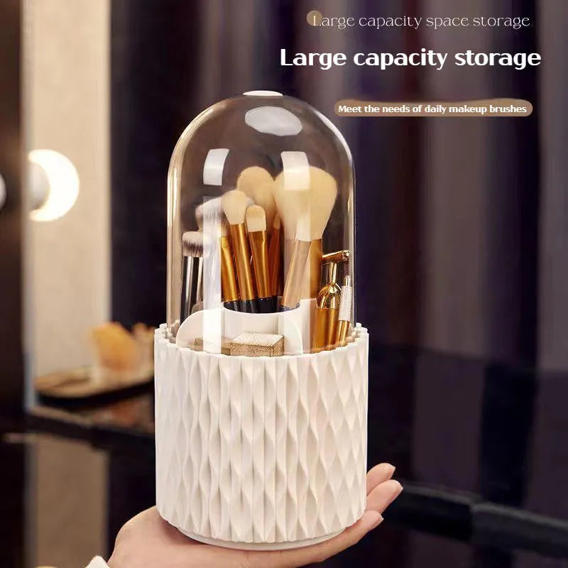 White transparent acrylic makeup brush holder with lid on a desktop, showing rotating base.