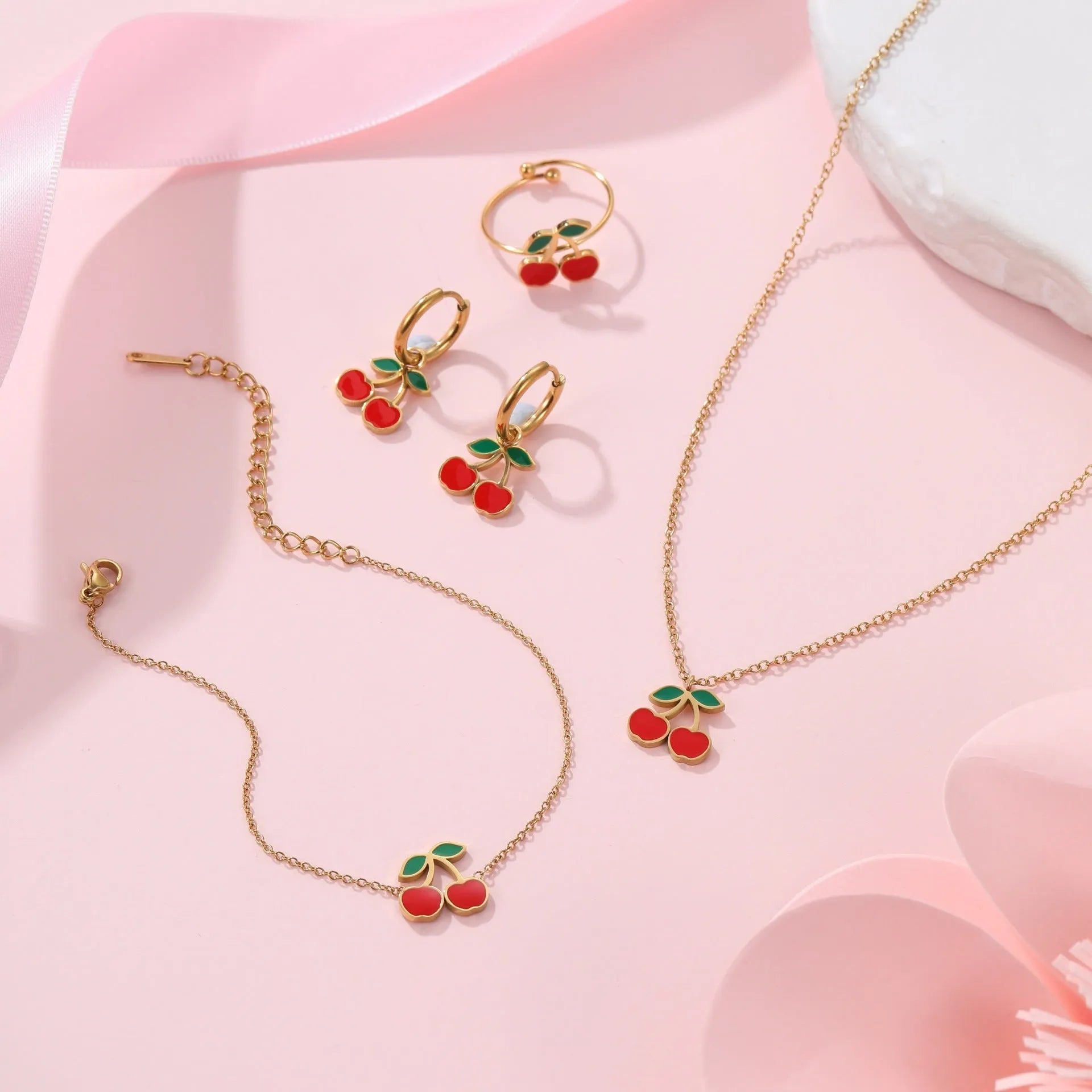 Cherry jewellery set with necklace, bracelet, earrings, and ring in stainless steel with 18K electroplated finish