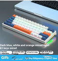 Small bluish black mechanical keyboard with 61 keys and hot-swap switch sockets