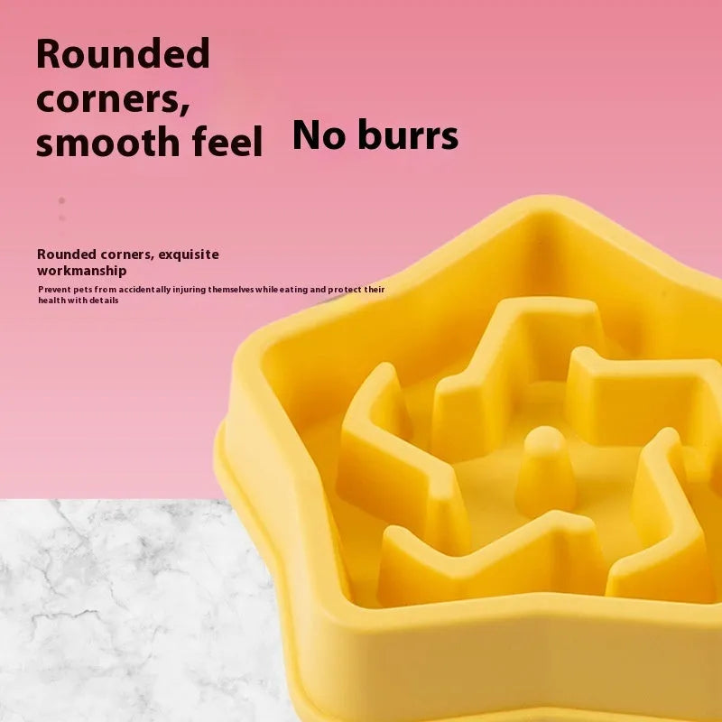 Yellow plastic dog slow feeding bowl with textured bottom for choking prevention