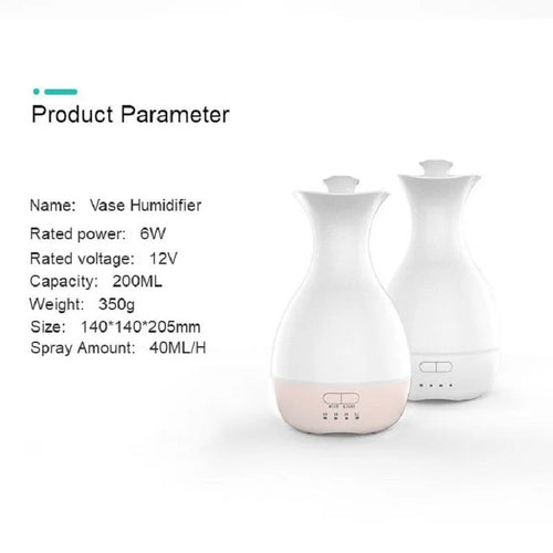 White ultrasonic aromatherapy diffuser with colourful LED light misting essential oils