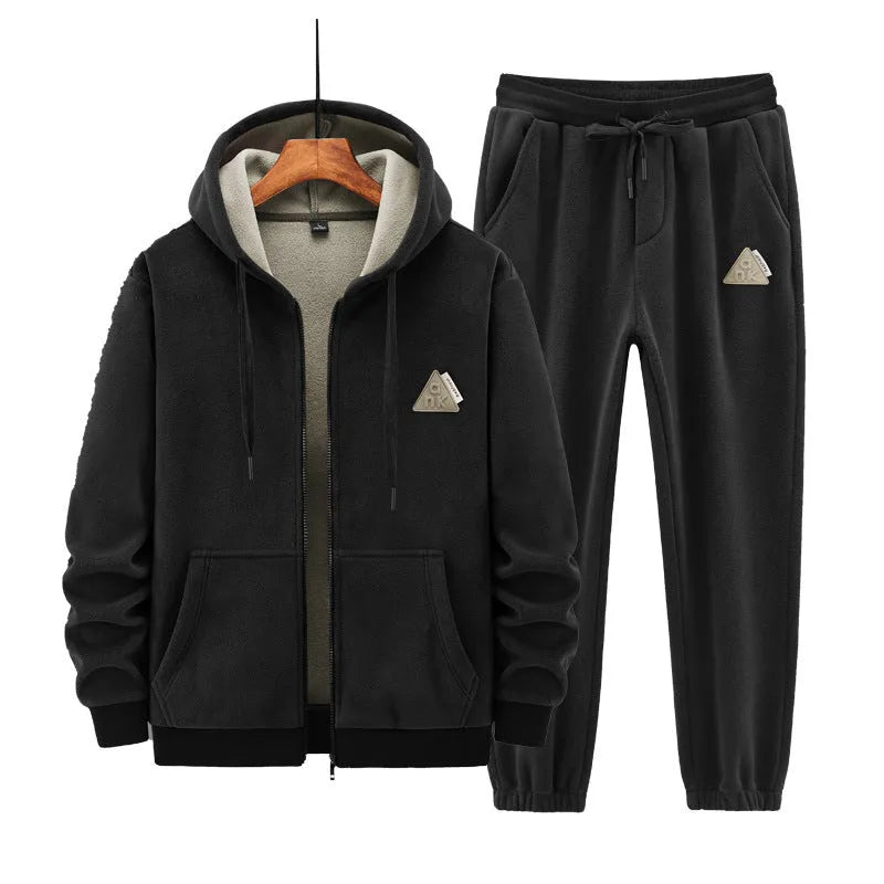 Grey men's hooded sweater and matching trousers casual sports suit set on a hanger.