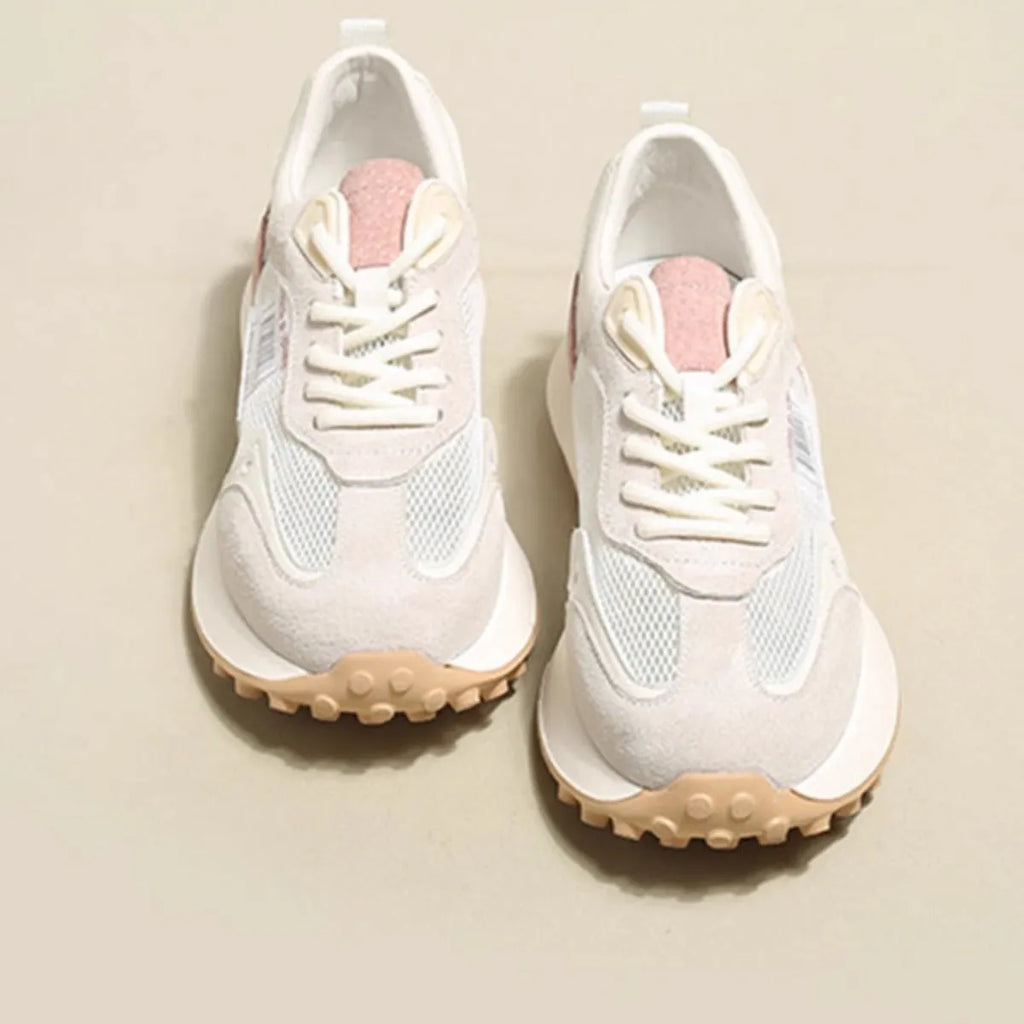 Women's grey and pink retro sneakers with low top design and rubber sole