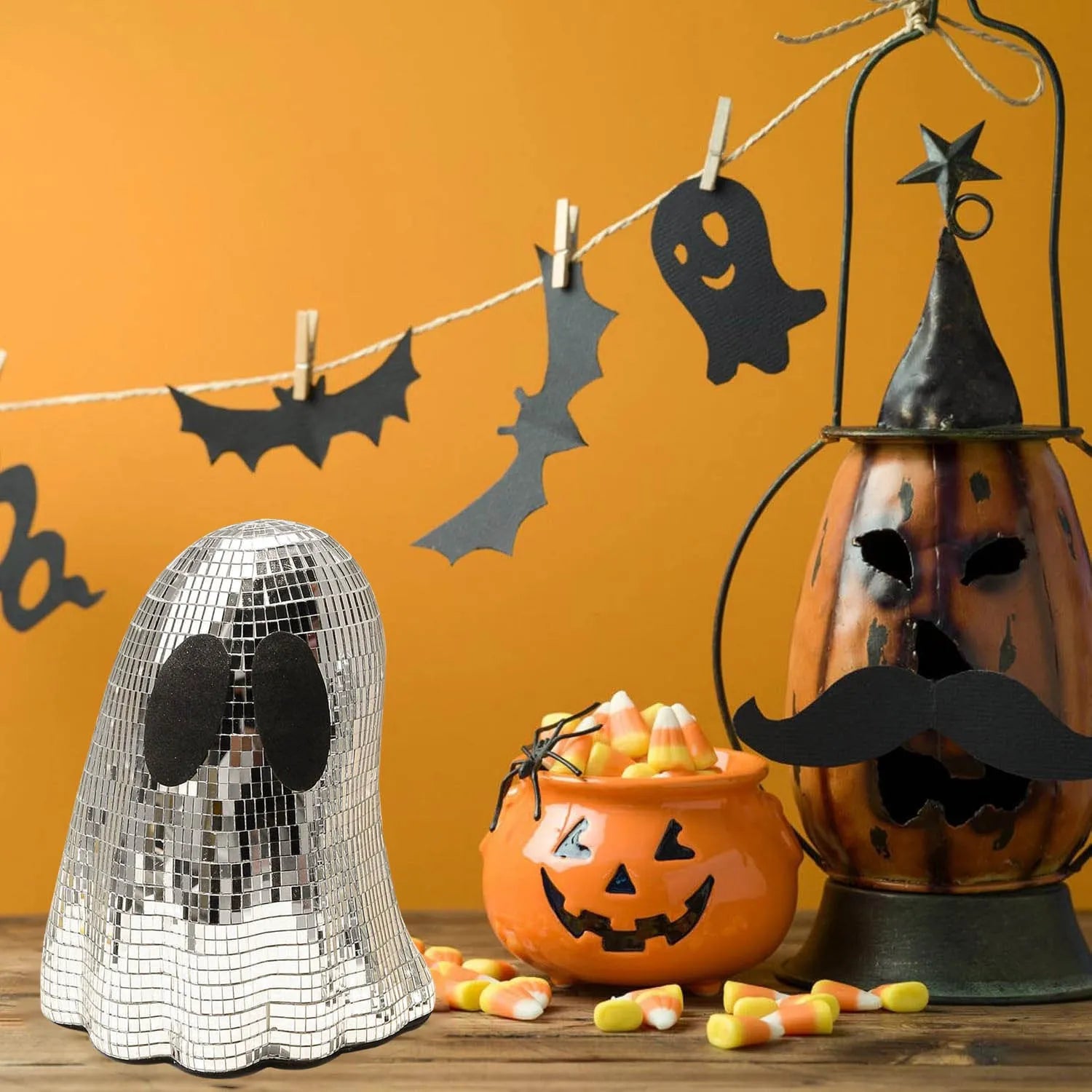 Silver Halloween ghost decoration with mosaic mirror patch design on desktop