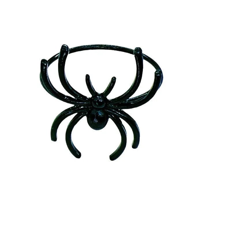 Six black spider-design alloy napkin rings for Halloween table settings