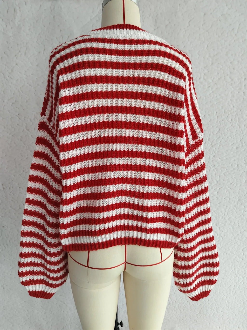 Women's loose fit stripe knitted pullover sweater with long sleeves in black colour