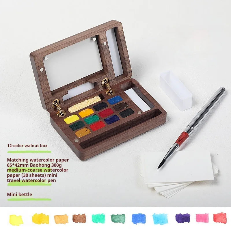 Mini walnut wood watercolour paint box with basic artist pigments and portable design