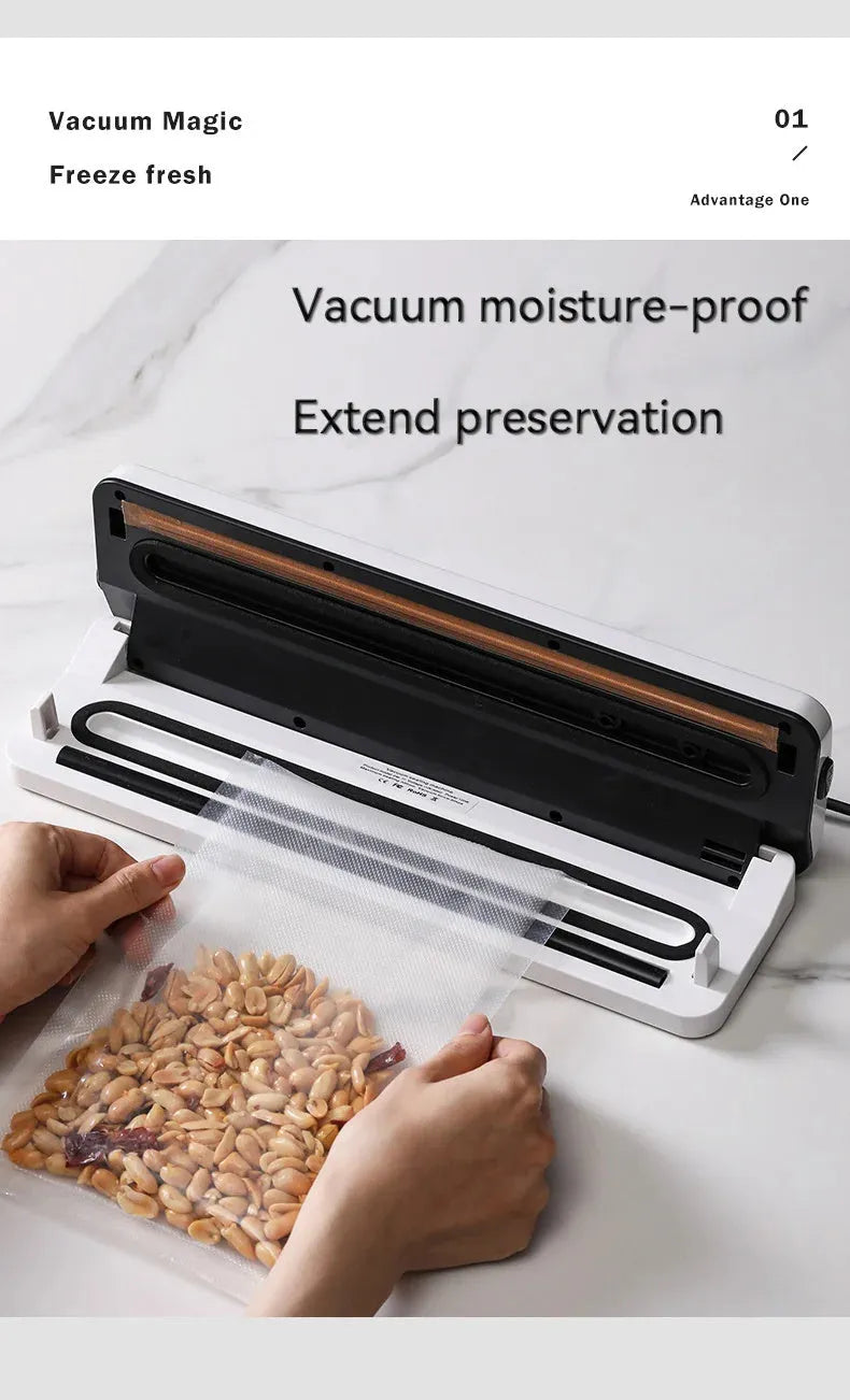Small white automatic vacuum sealing machine for home food preservation on a kitchen counter.