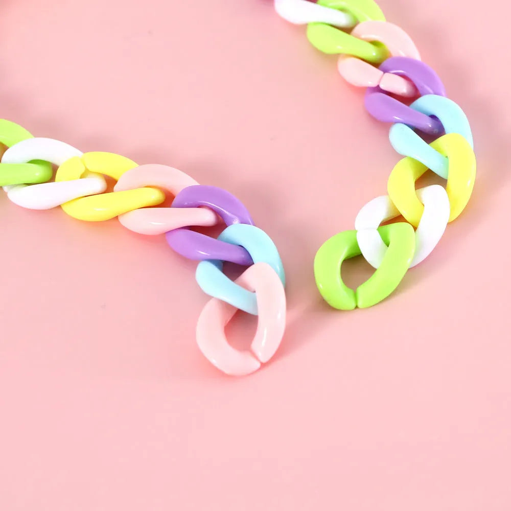 Plastic macaron candy colour chain-style pet collar for cats and dogs in blue, pink, and mixed colours.