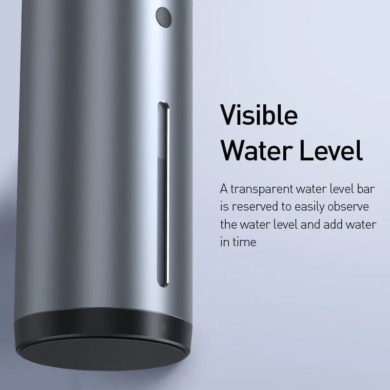 Black aluminium alloy car diffuser humidifier with USB cable on a car dashboard