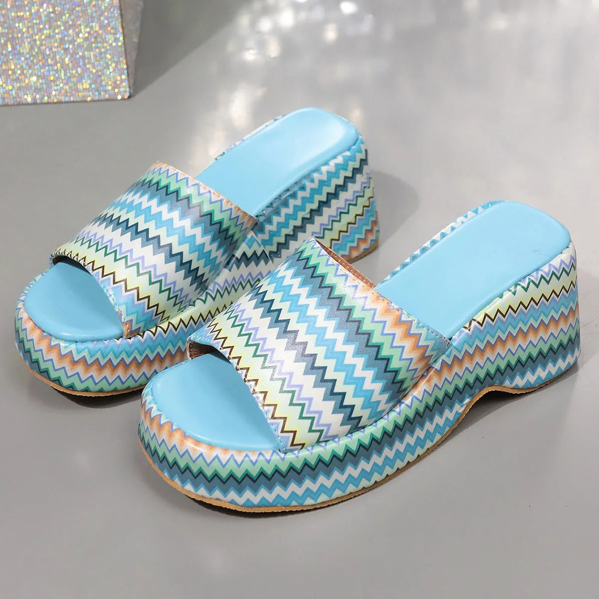 Women's beige wedge sandals with colourful wave print and thick rubber sole