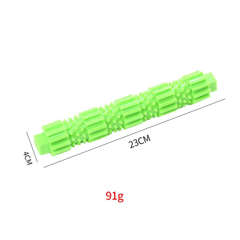 Green natural rubber dog chew toy with textured surface and treat holes for aggressive chewers