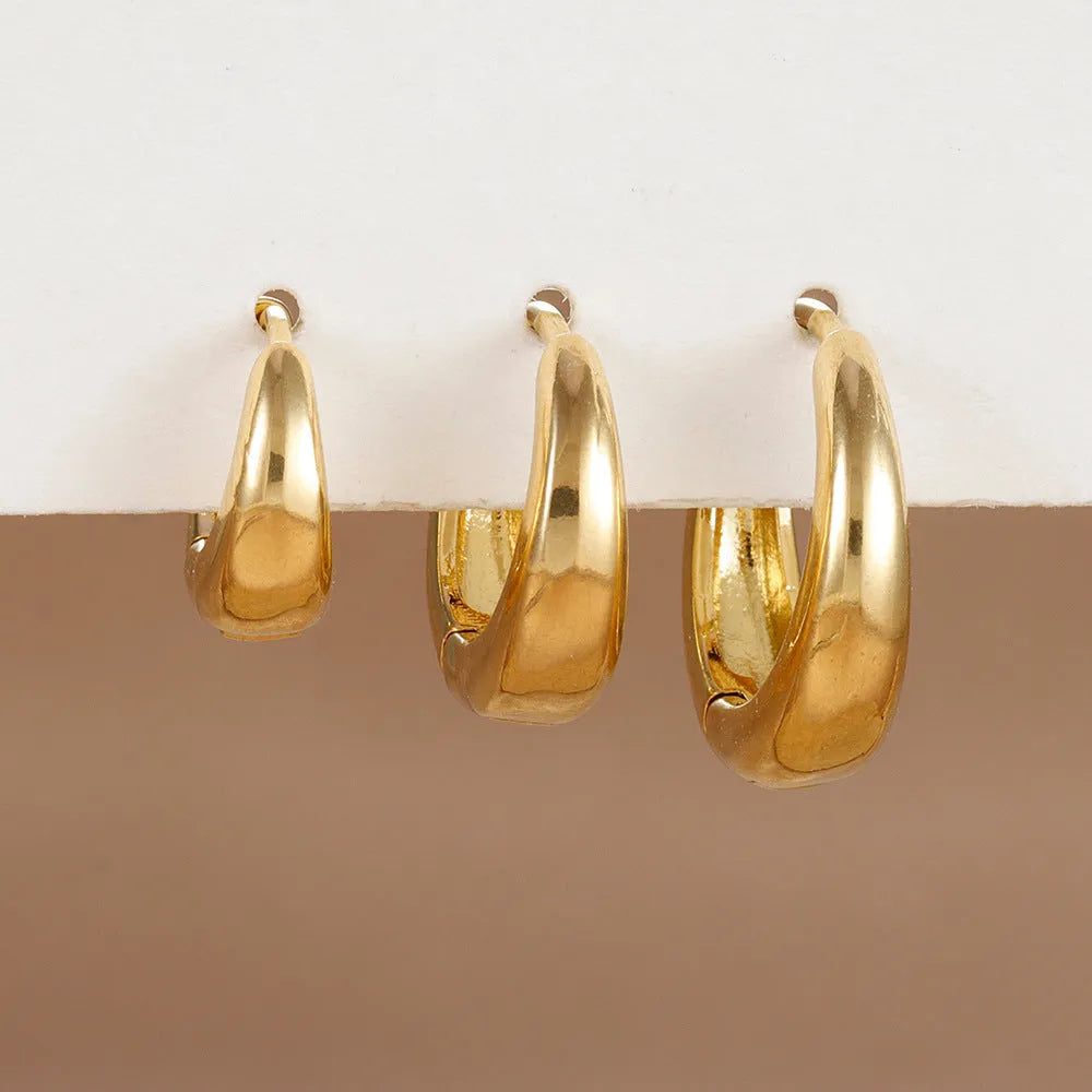 Geometric copper earrings 3-piece set in gold tone with electroplated glossy finish and round design