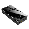 Large black power bank with LCD display showing battery percentage, dimensions 156x82x41mm