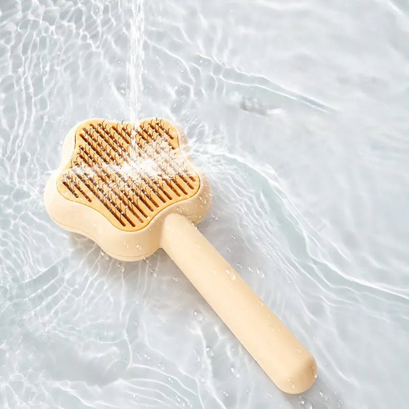 Self-cleaning cat grooming comb with stainless steel needle teeth in green colour option
