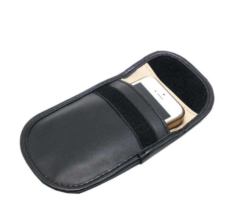 Black microfiber Faraday cage signal blocker bag for car keys and phones measuring 13.5 by 9.5 centimetres