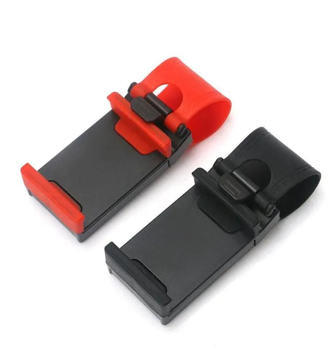 Black steering wheel phone holder mounted showing elastic clip and silicone phone padding