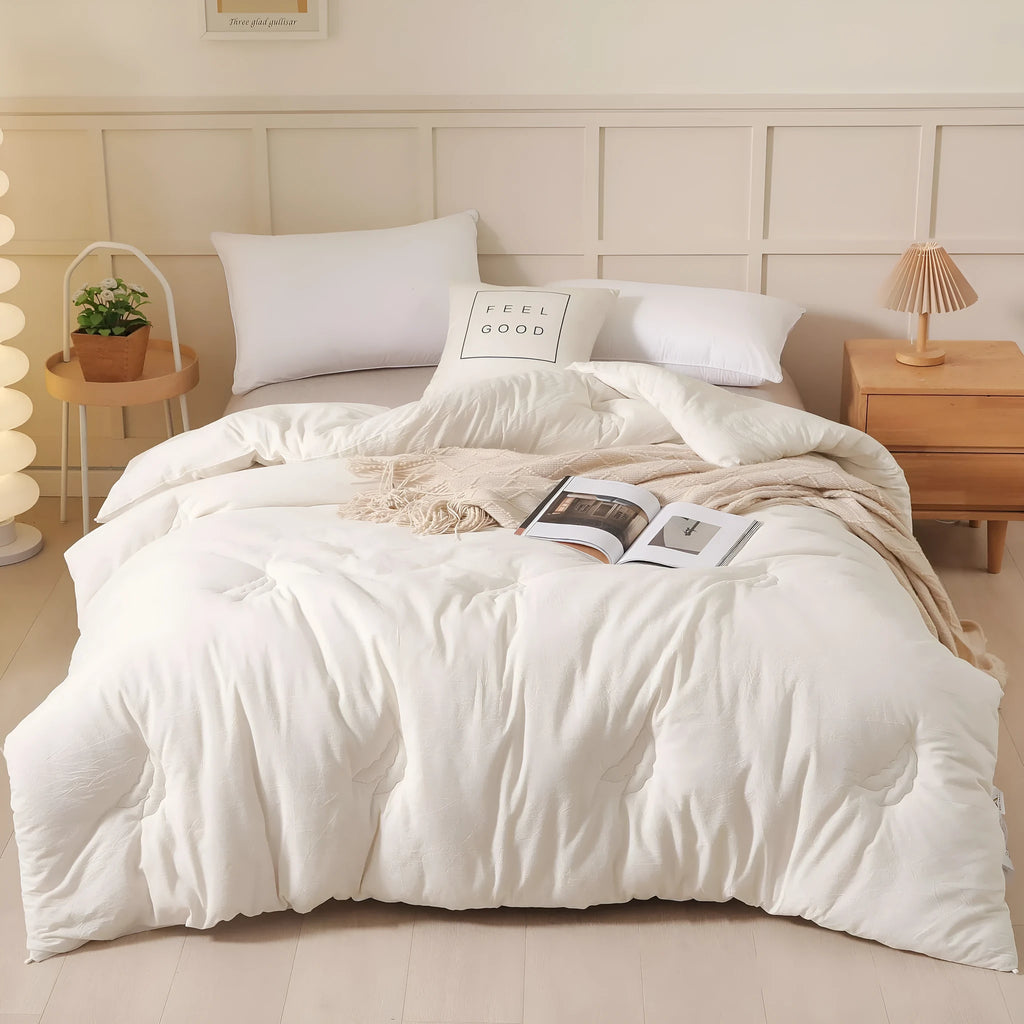 Soybean fibre quilt with pure cotton cover in white, grey, or pink jade, shown in various sizes on a bed.