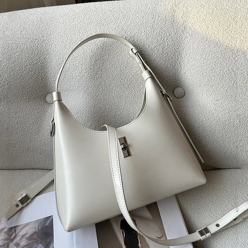 Genuine leather crossbody shoulder bag in dumpling shape with organised compartments