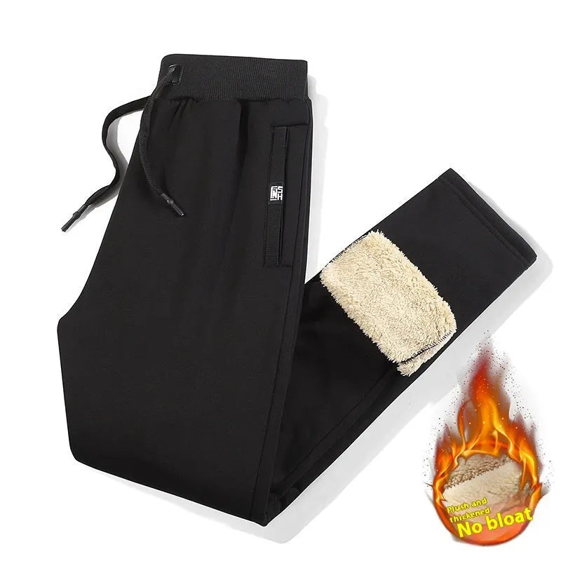 Men's grey fleece-lined cotton track pants with drawstring waistband in oversized fit