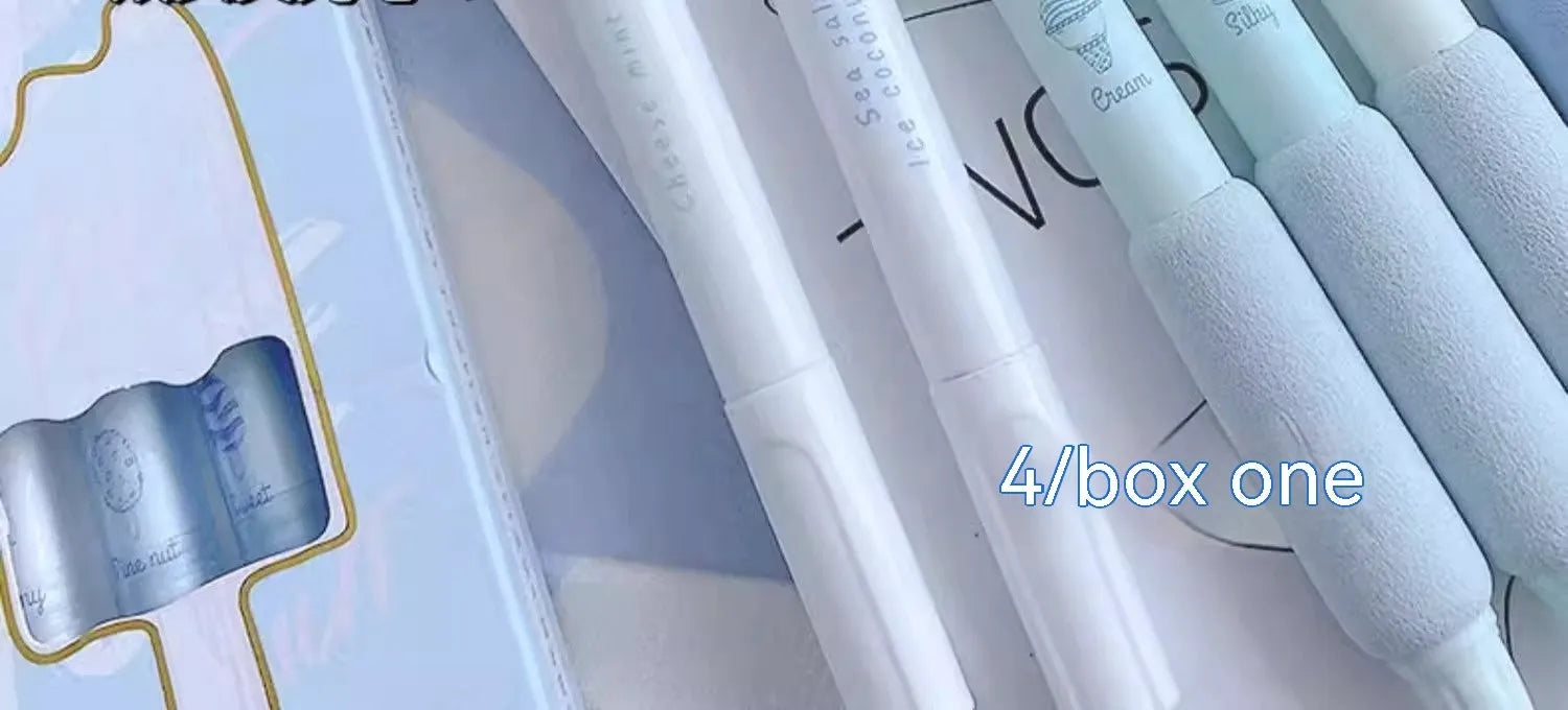 Set of four double-headed calligraphy pens with 0.5mm tips and sponge press nibs in cheese mint and sea salt colours