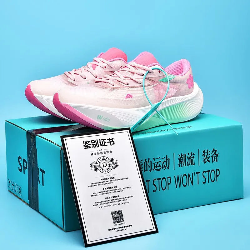 Low-top carbon plate racing sneakers in multiple colours with front lace-up and natural rubber sole.