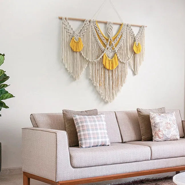 Nordic style hand-woven cotton tapestry in creamy-white with yellow detailing