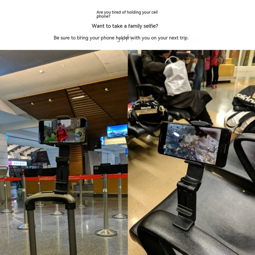 Black foldable rotating phone stand holding a mobile phone in landscape orientation on a desk.